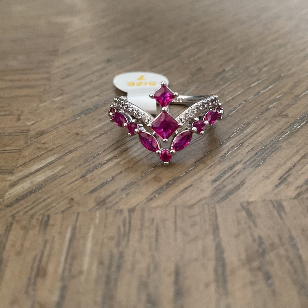 “Dance Away With Me” Main Stone: Lab Created Ruby. Materials: Rhodium Plating